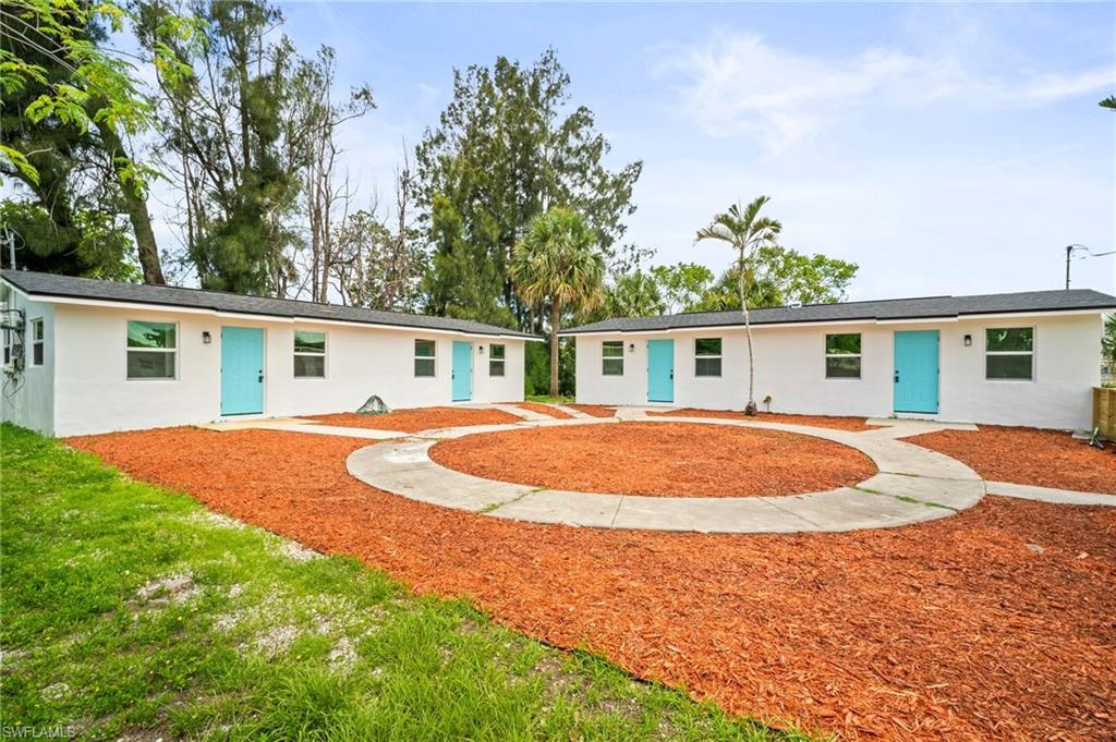 View of front of property featuring stucco siding