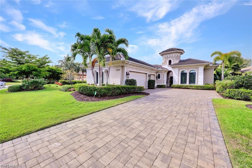 Welcome to 28864 Blaisdell - with a front yard, decorative driveway, a garage, and stucco siding