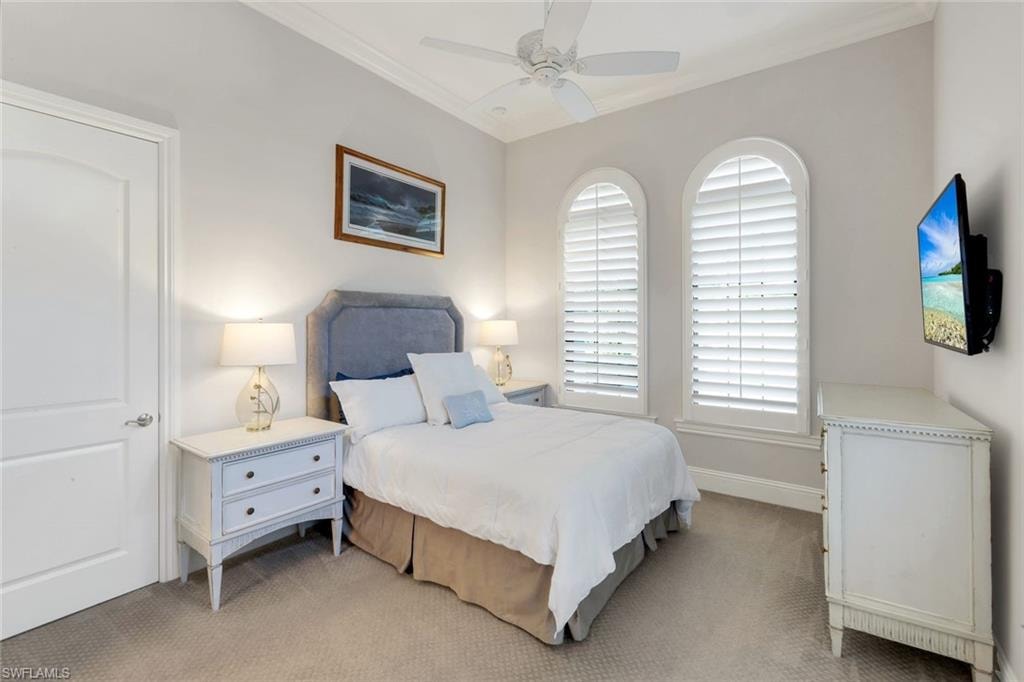 4th Bedroom featuring Queen Bed, carpet, ceiling fan, and crown molding