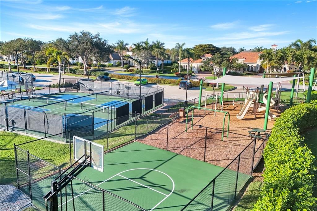View of community featuring tennis, pickleball