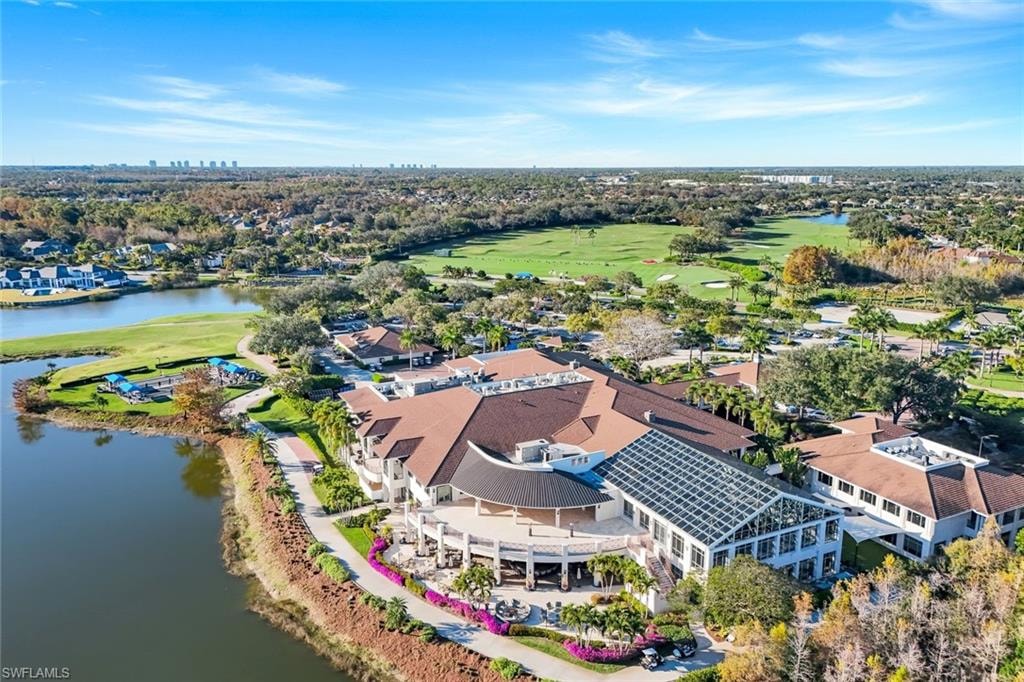Clubhouse - Drone / aerial view of a nearby body of water and a golf course