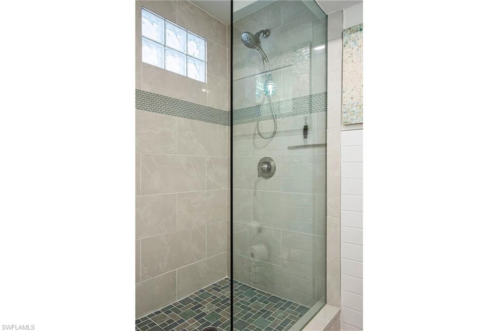 Bathroom featuring an enclosed shower