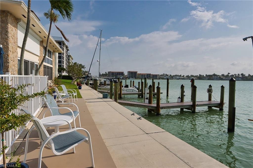 View of dock with a water view