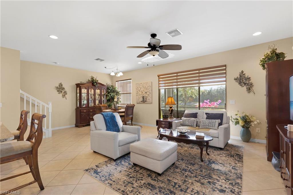 Tiled living room with ceiling fan