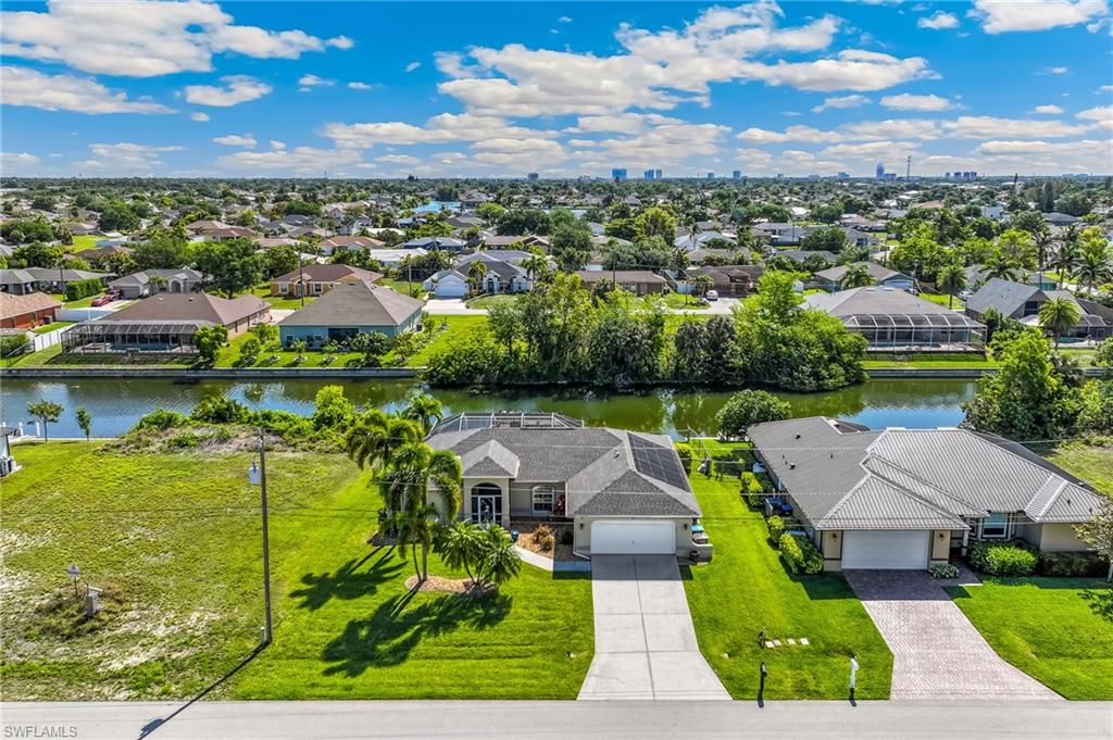 Lovely Furnished Home in NE Cape Coral situated on a Fresh Water Canal with 5 miles of recreational boating.