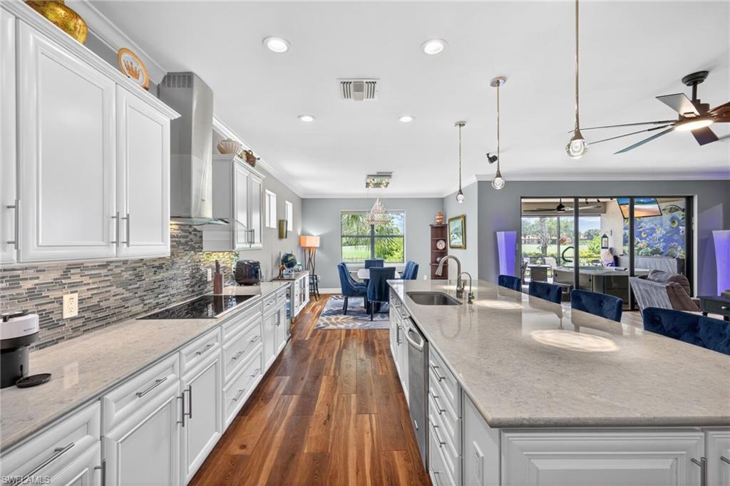White Cabinetry & Sand Colored Silestone Quartz Countertops