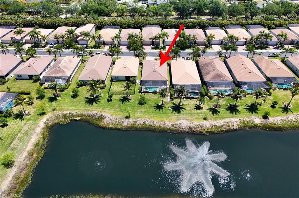 House location on the lake, view of fountain