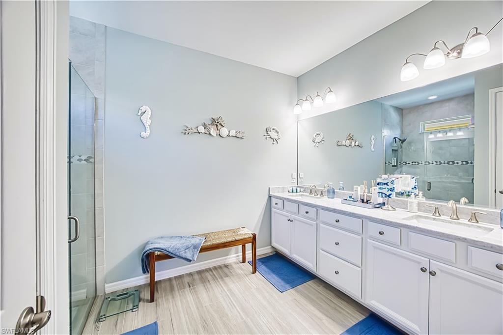 Master bathroom with 2 sinks and shower