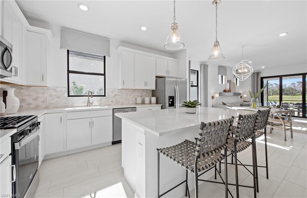 Photos are from a furnished model.