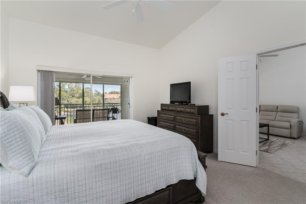 Vaulted ceiling room with private balcony access