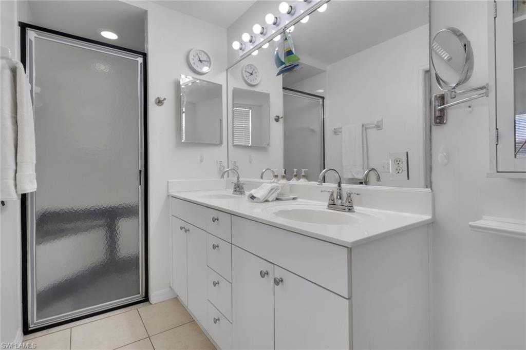 Primary bath with walk in shower and double sinks