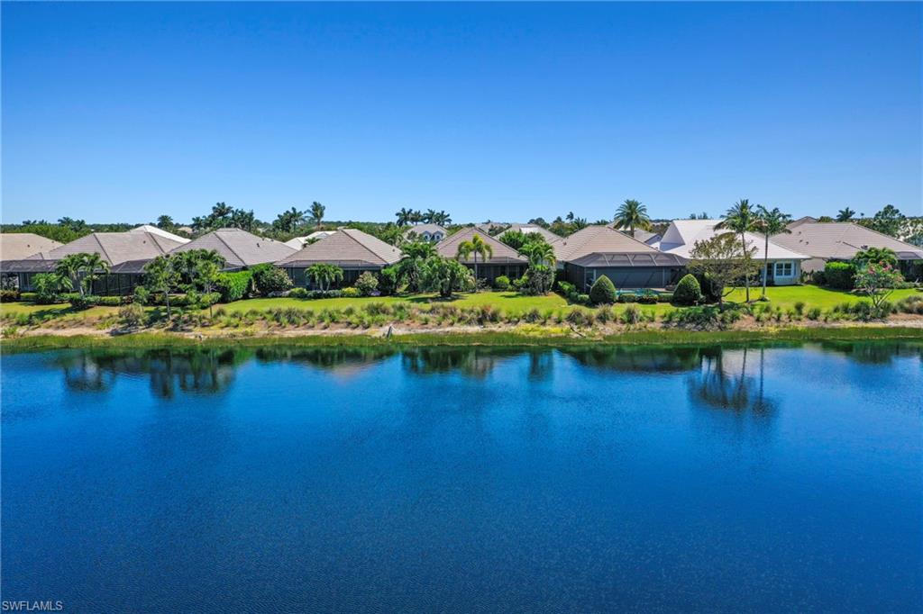 Expansive water feature with multiple single-story residences