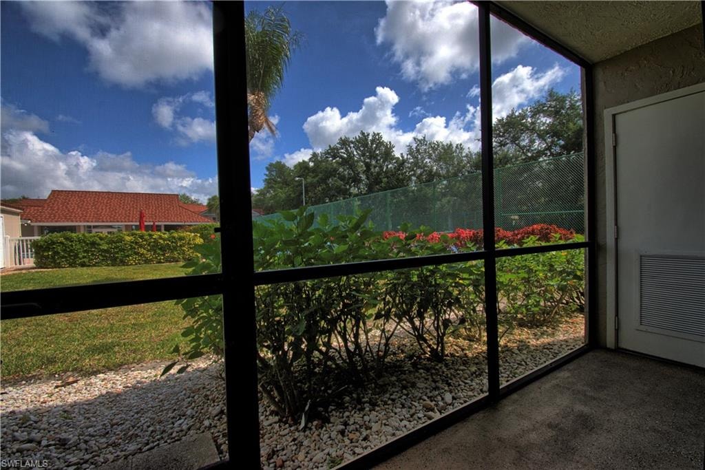 Screened patio offering outdoor living space