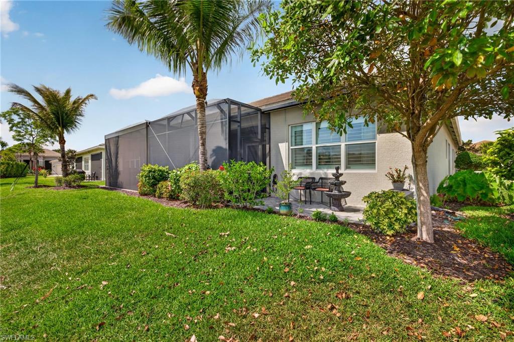 Great pix of the extended, caged, lanai PLUS the addition rear patio space outside the primary bedroom. All areas feature a lake view!
