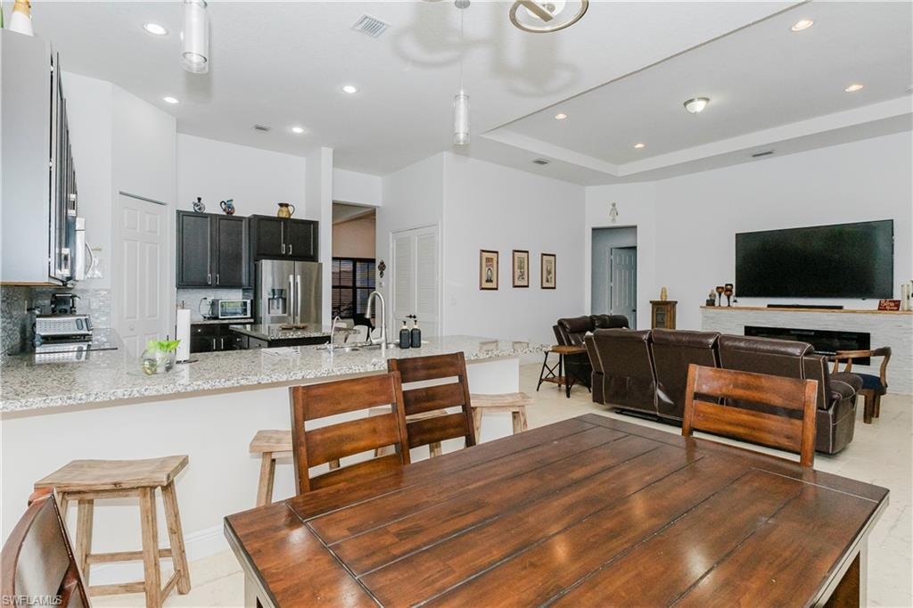 Dining area with recessed lighting