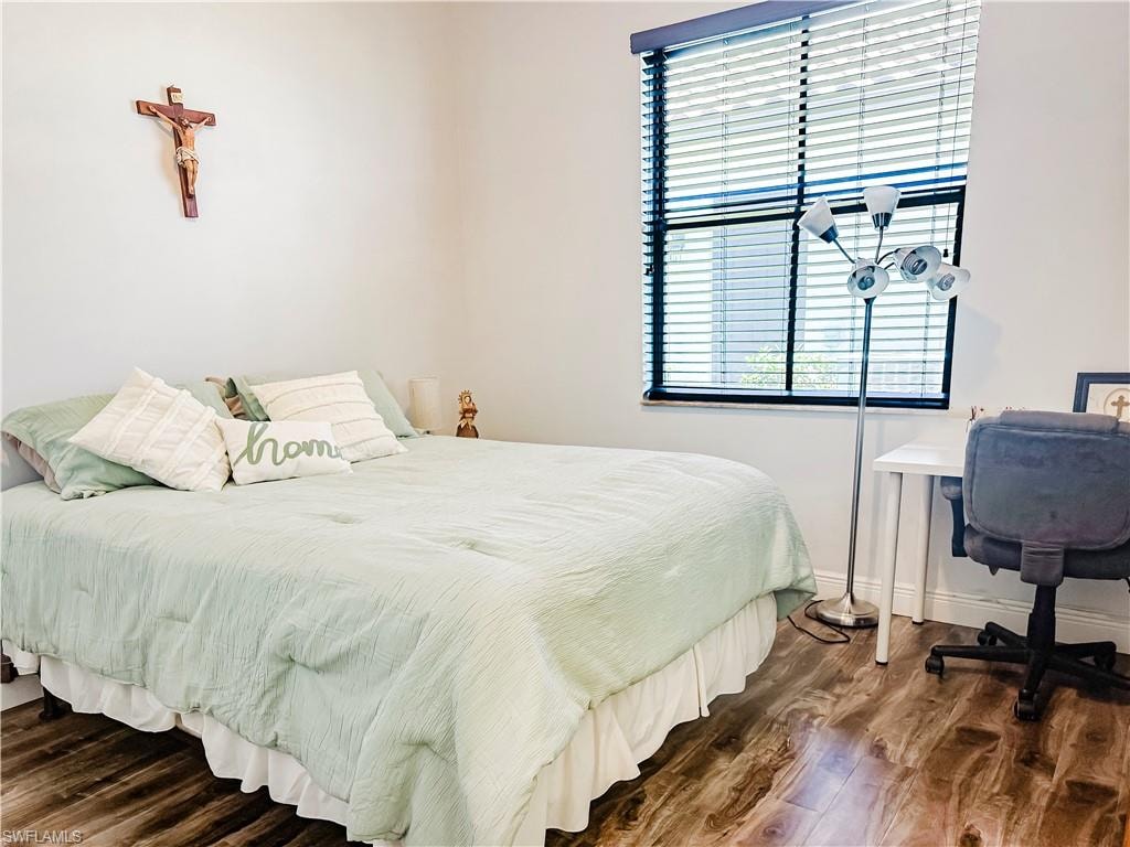 Bedroom featuring wood finished floors