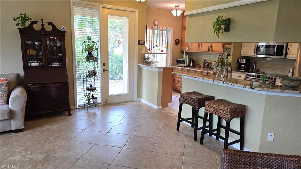 Glass panel entry door offers light & bright ground floor living!