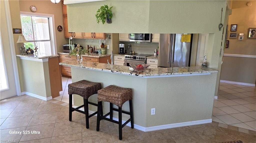 Open Kitchen with Bar Seating!