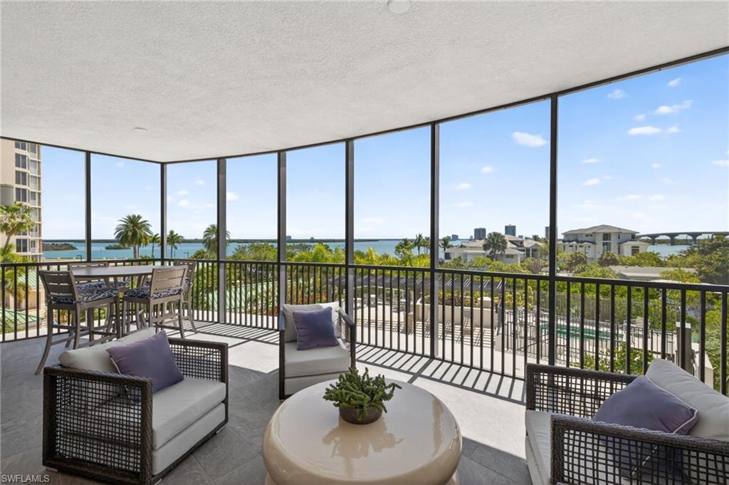 Large screened in terrace , comfortable space for relaxing and taking in the tropical views