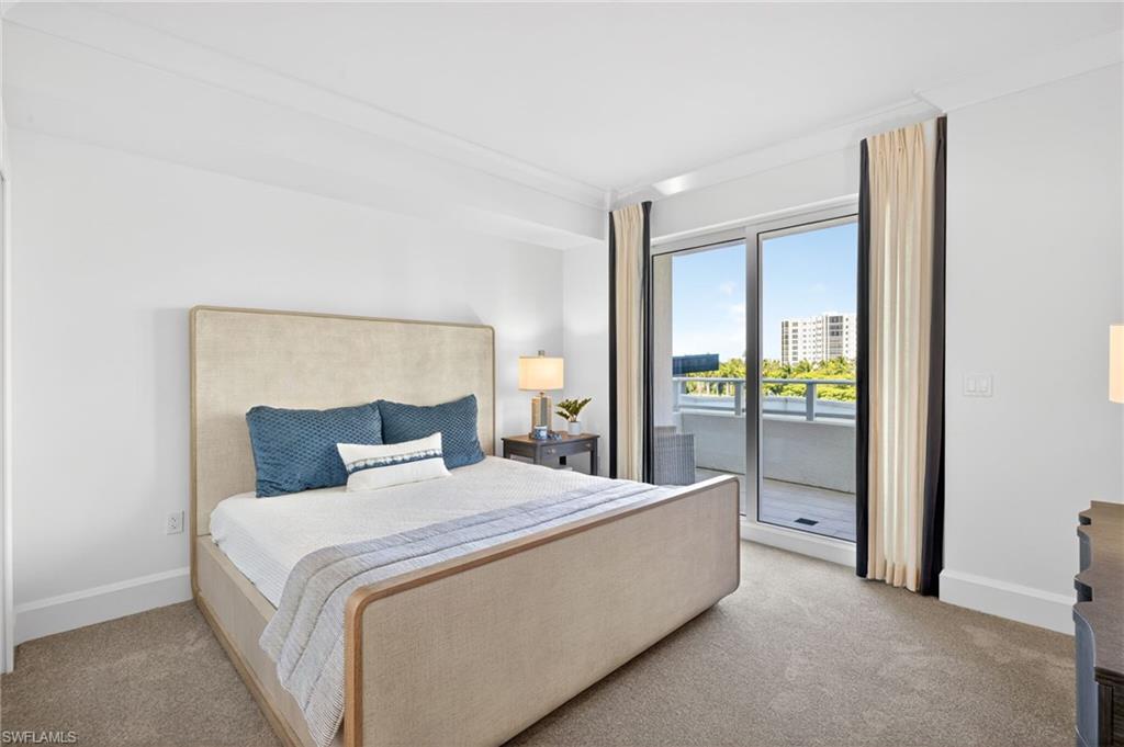 Bedroom 2 is cozy with  sliders to a private open balcony