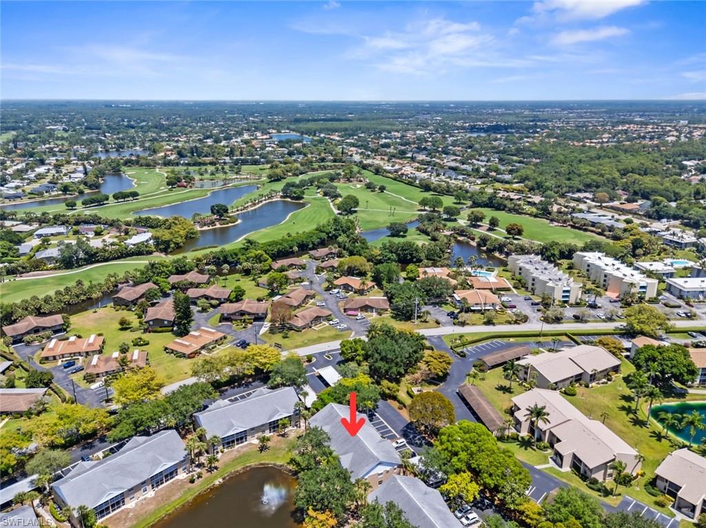Aerial perspective showcasing the residential complex with direct golf course frontage