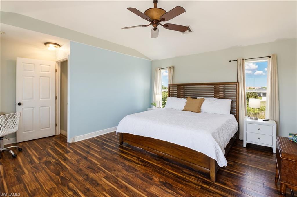 Private primary bedroom on the second floor with water views.