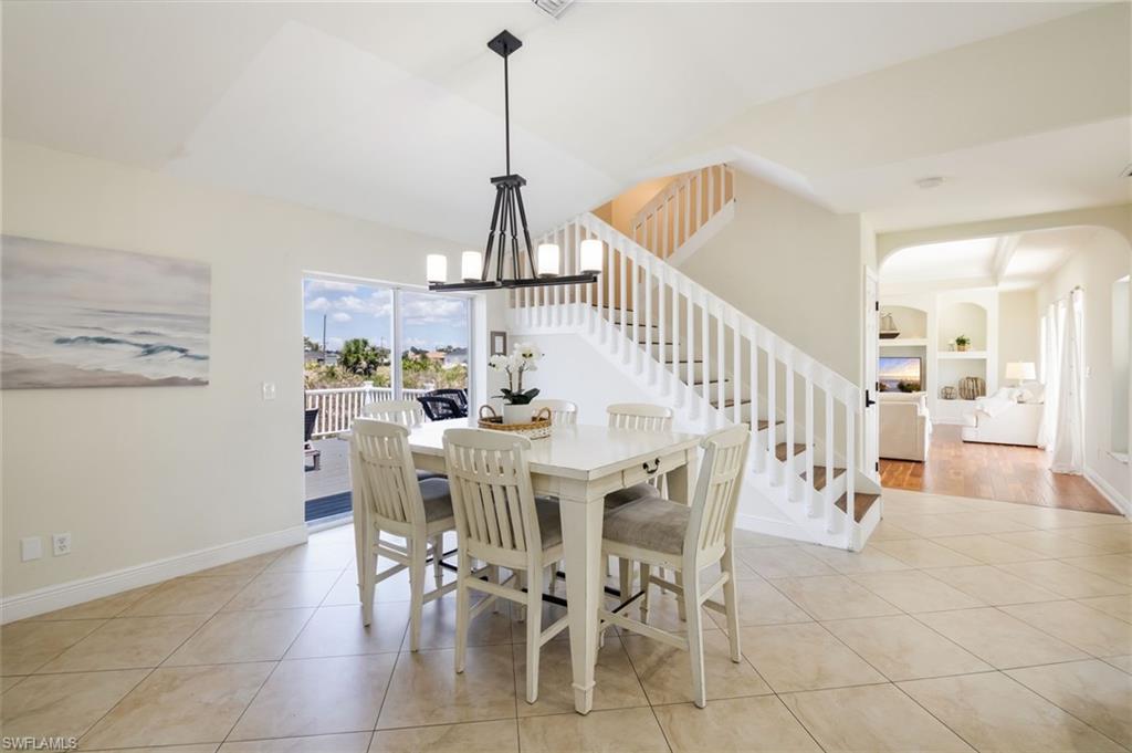 The dining area is just off the kitchen and den/game room area.