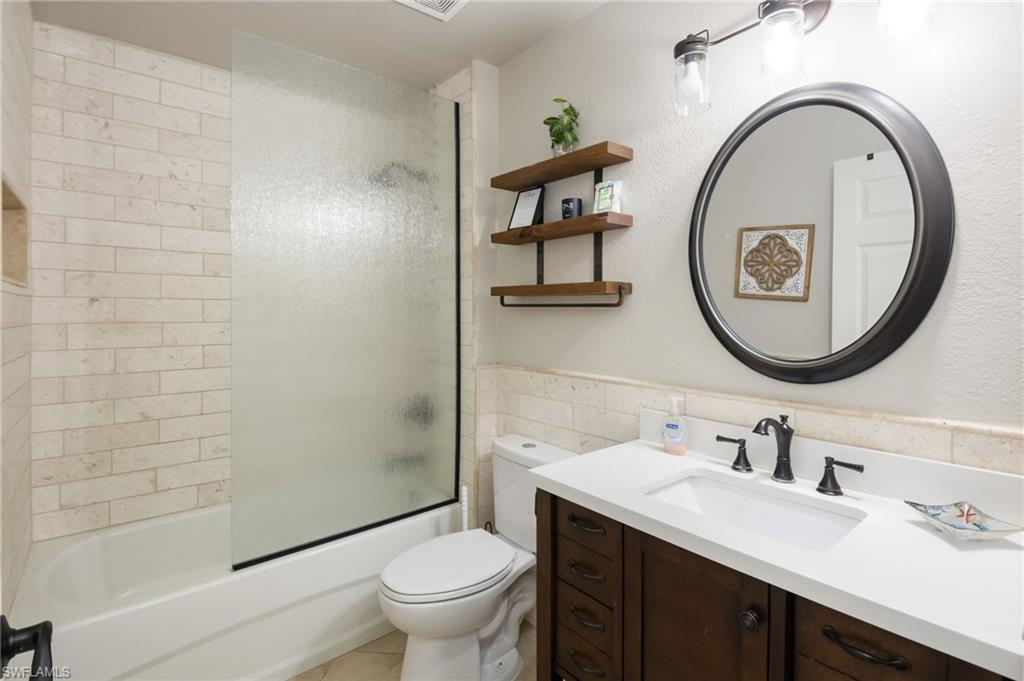 Shower/bath combo in guest rest room.