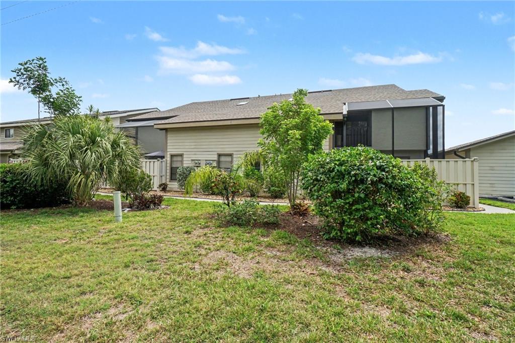 Large landscaped area behind the home, quiet and private