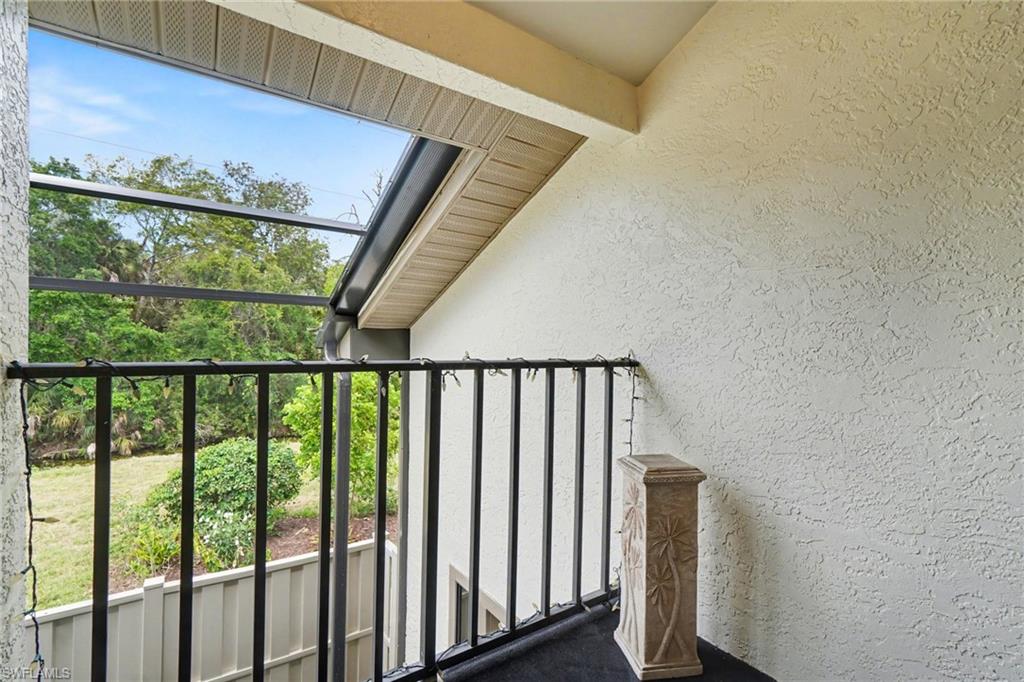 off upstairs bedroom opens onto the screened courtyard