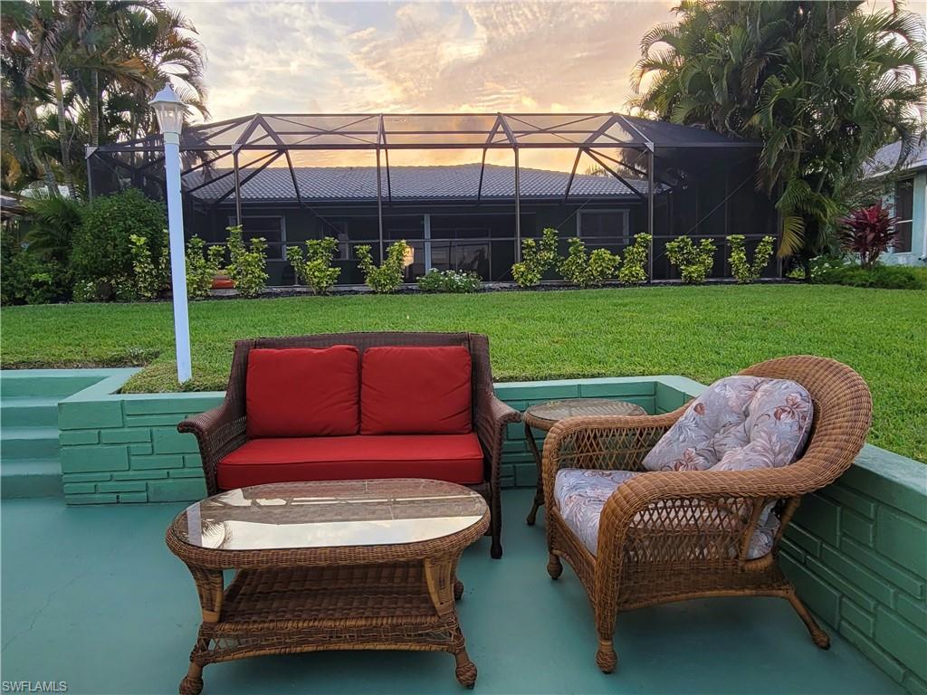 Expansive screened-in enclosure providing outdoor living space