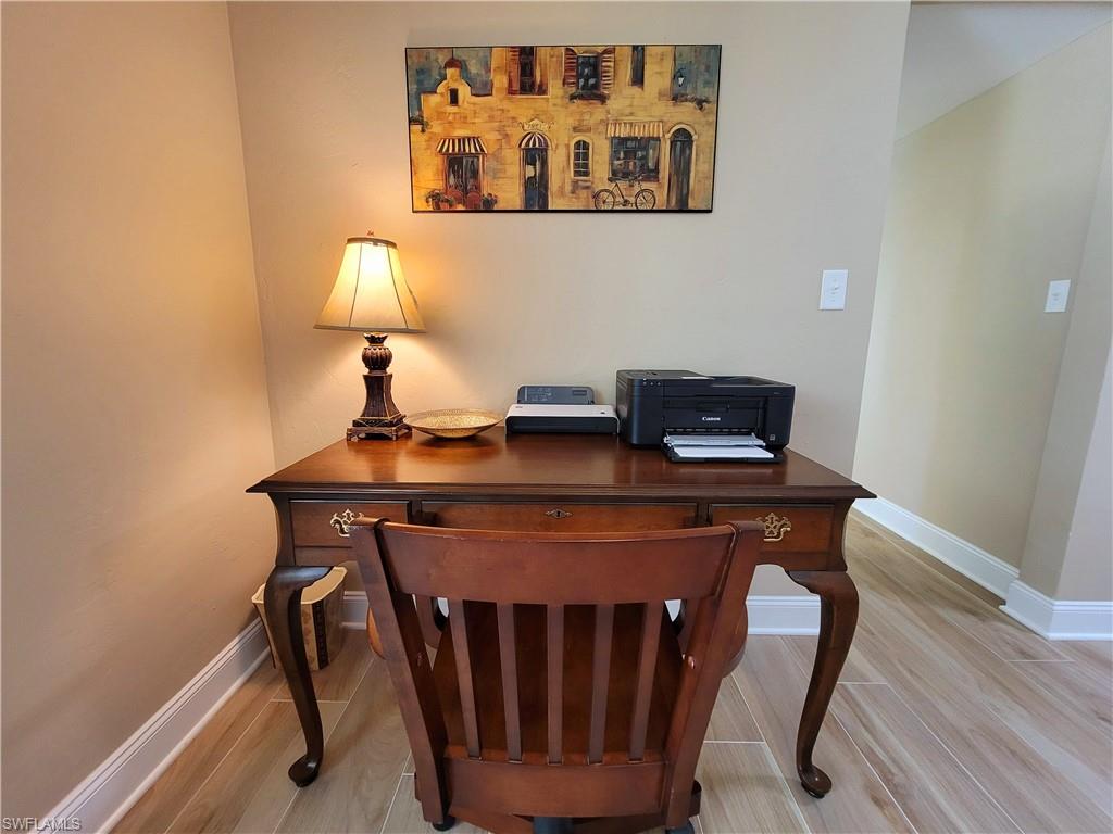 Dedicated niche with light wood-finish flooring