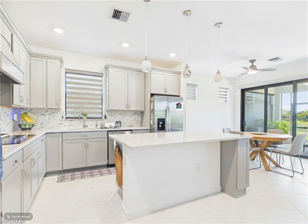 Kitchen staged with furniture