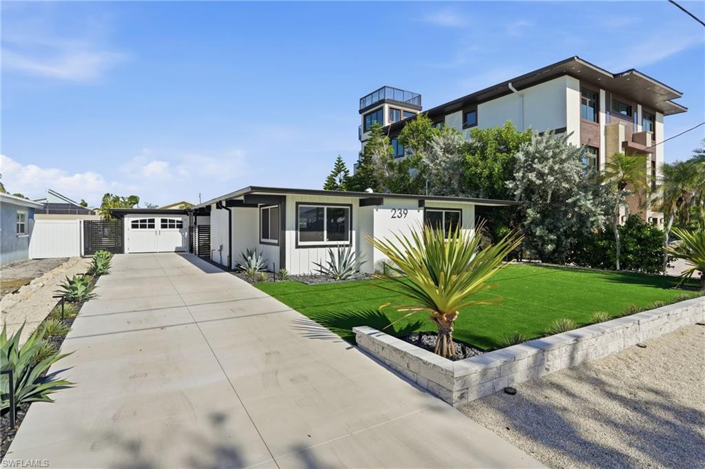 Beautiful landscaping & synthetic lawn - Virtually Edited Image