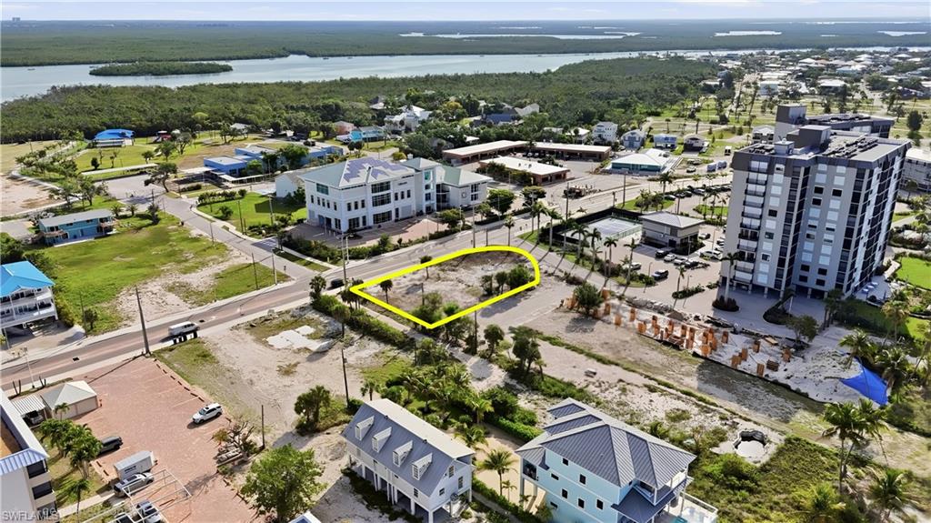 Cleared building lot featuring street frontage on two sides - Virtually Edited Image