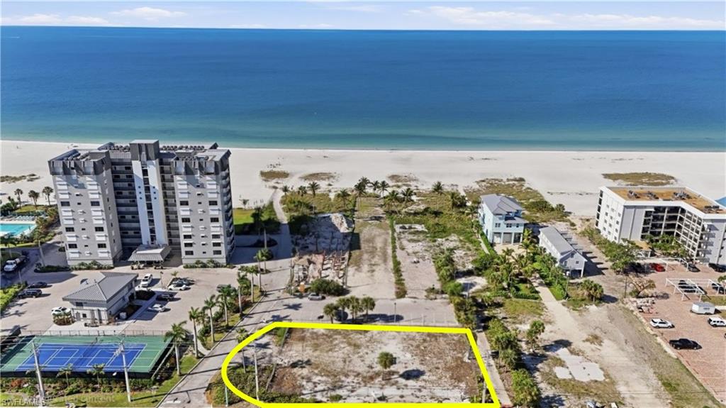 Cleared parcel featuring a direct beachfront location with expansive ocean frontage - Virtually Edited Image