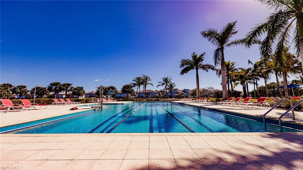 Community pool featuring a patio area