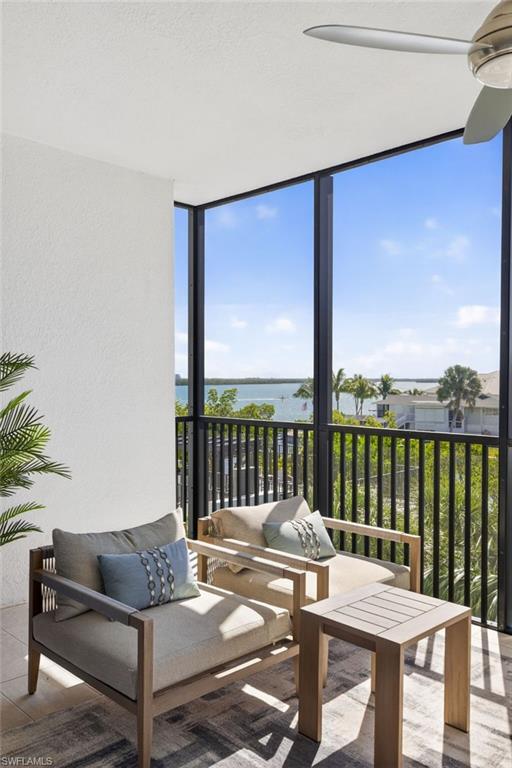 Screened in terrace with water scenery