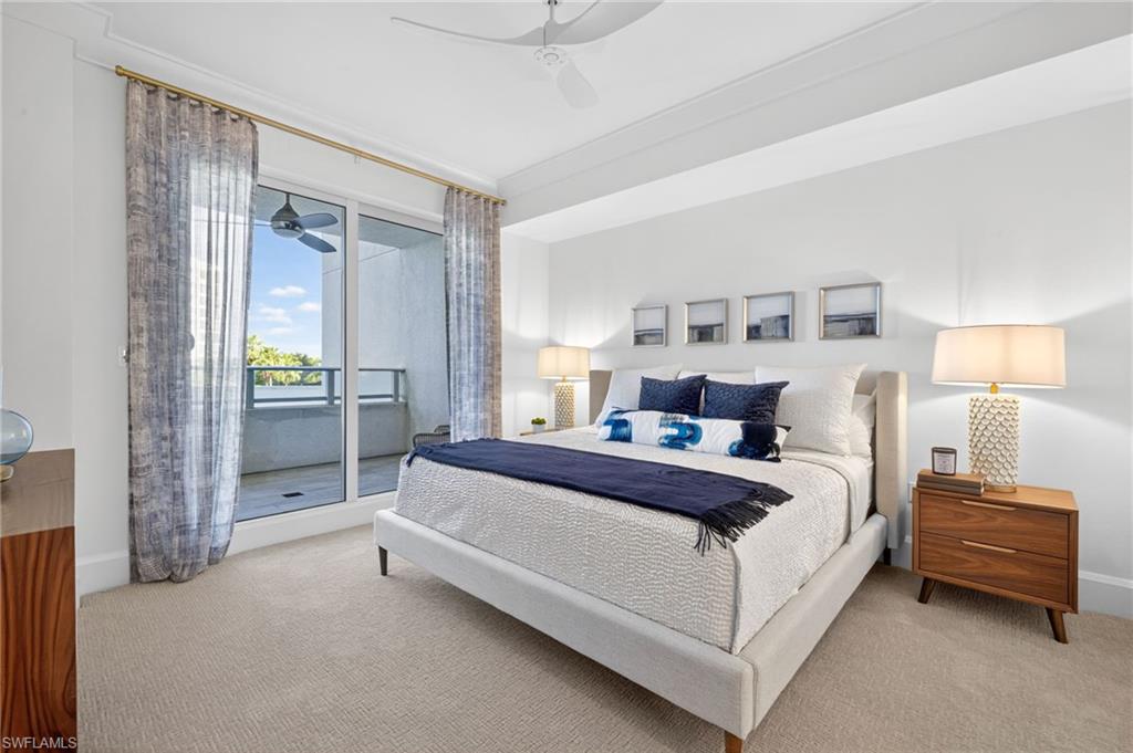 Bedroom 2 is cozy with sliding glass doors opening to a private open balcony