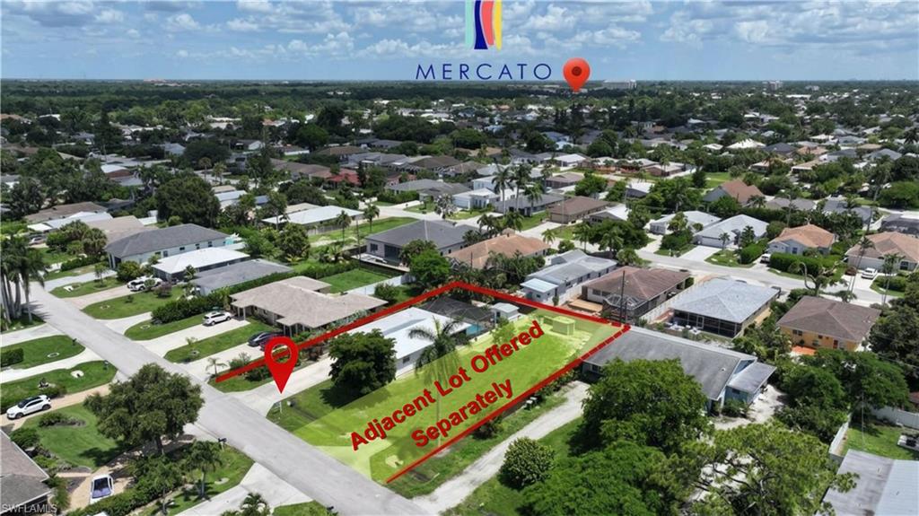 Aerial overview of a residential neighborhood with single-story homes