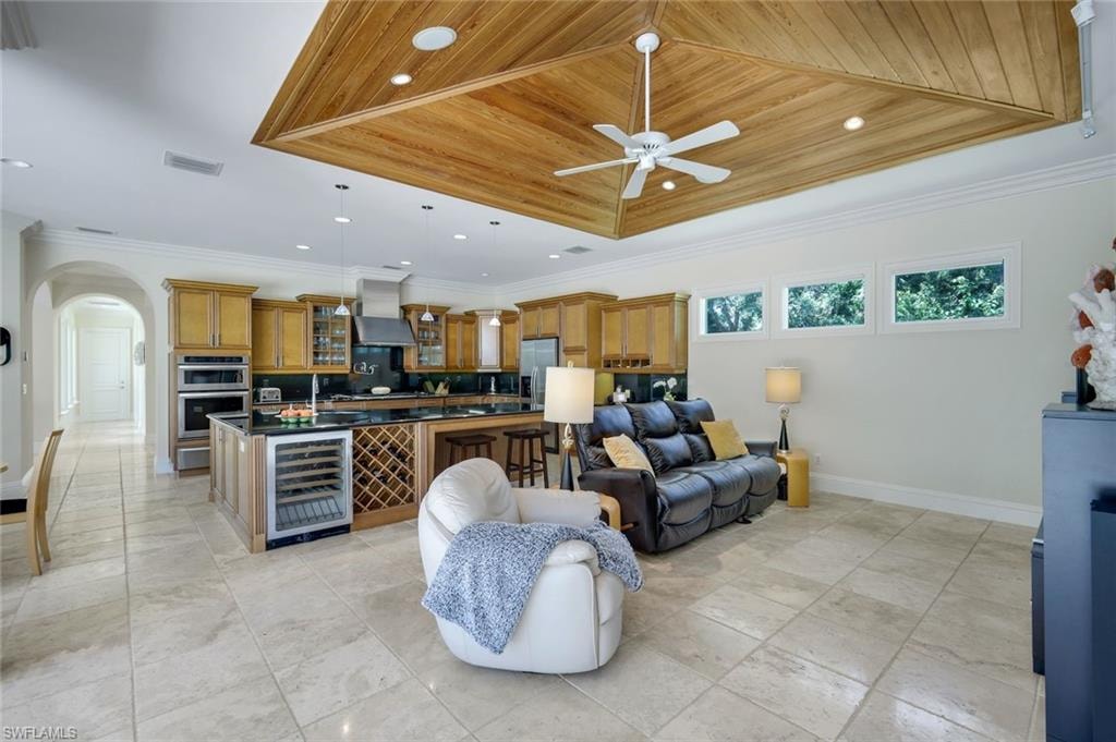 Inverted Wood Panel Tray Ceiling Enhances the Organic Design