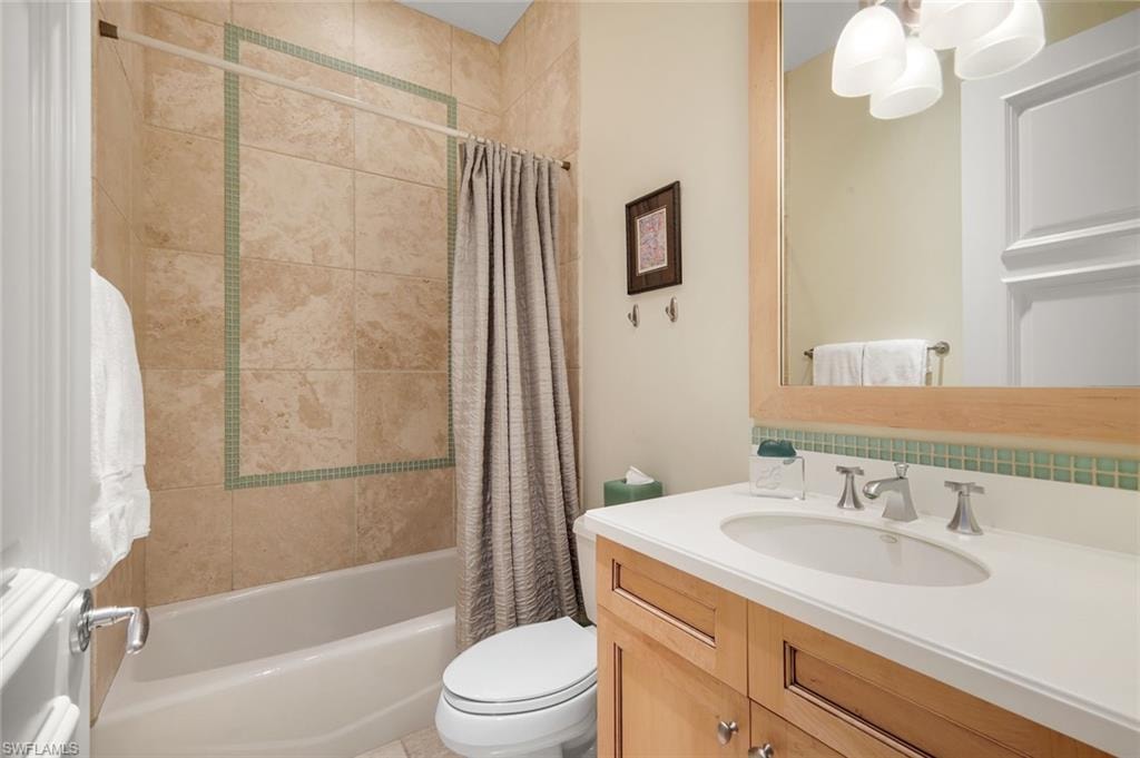 En-Suite Bath w. Custom Vanity/Mirror & Tub-Shower Stone Tile to Ceiling