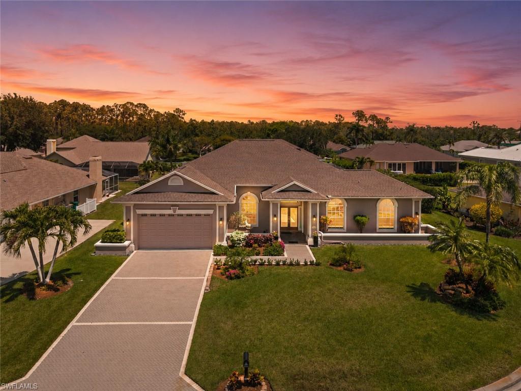 Single-story stucco exterior with a hip roofline