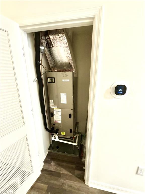 HVAC system housed within a dedicated utility closet, featuring a smart thermostat