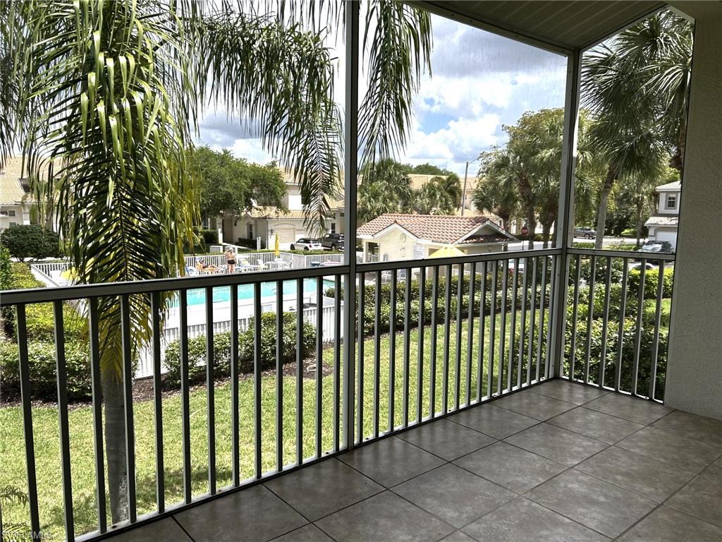 Screened lanai featuring a view of the pool