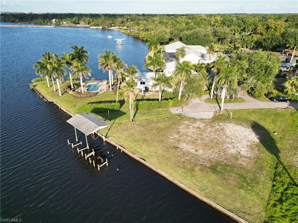 Build your paradise on 157 feet of stunning riverfront — where sunsets paint the Caloosahatchee gold.