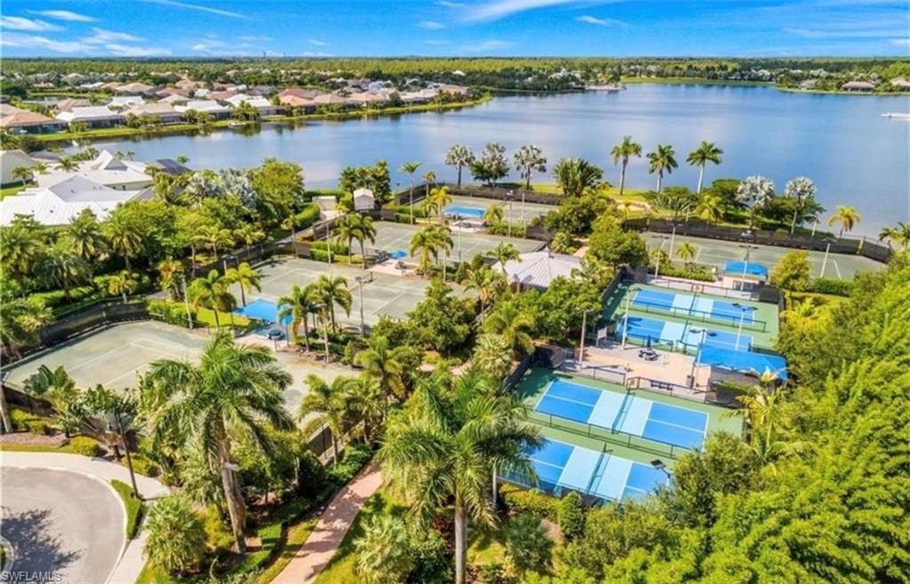 Expansive recreational grounds featuring multiple tennis courts and dedicated pickleball courts