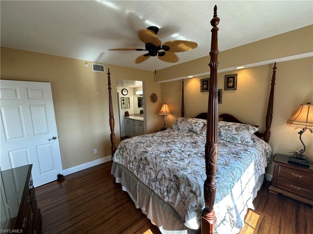 Bedroom featuring wood-finish flooring, recessed lighting, and a ceiling fan