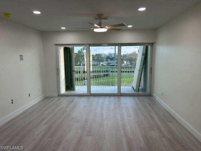 Living Room opening to screen enclosed lanai with new hurricane sliders.