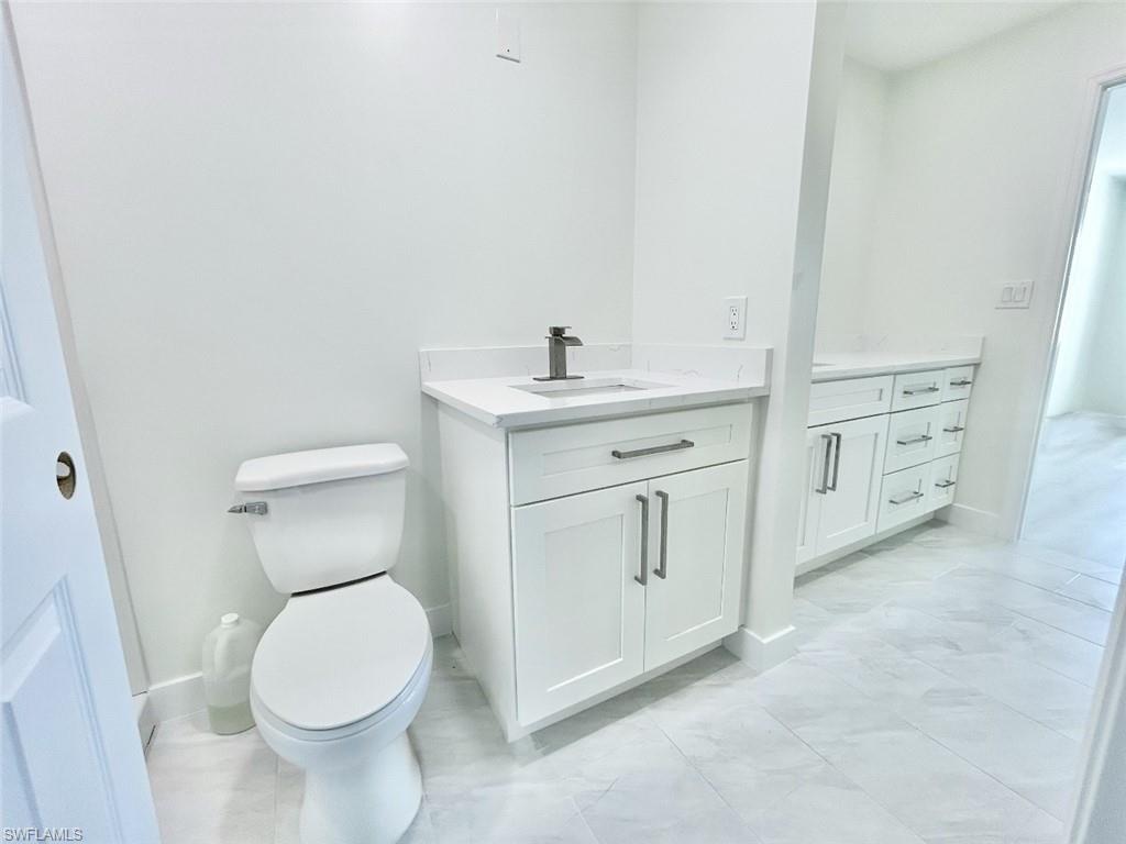 New Bathroom, 2 sinks, shower, and walk in closet.
